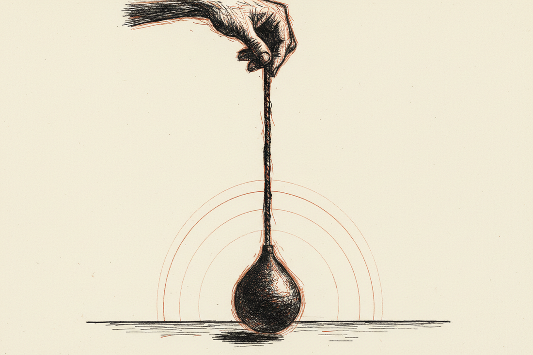 A drypoint print of a pendulum hanging from a hand above a table with faint arcs showing its swing, in charcoal, rust, and cream