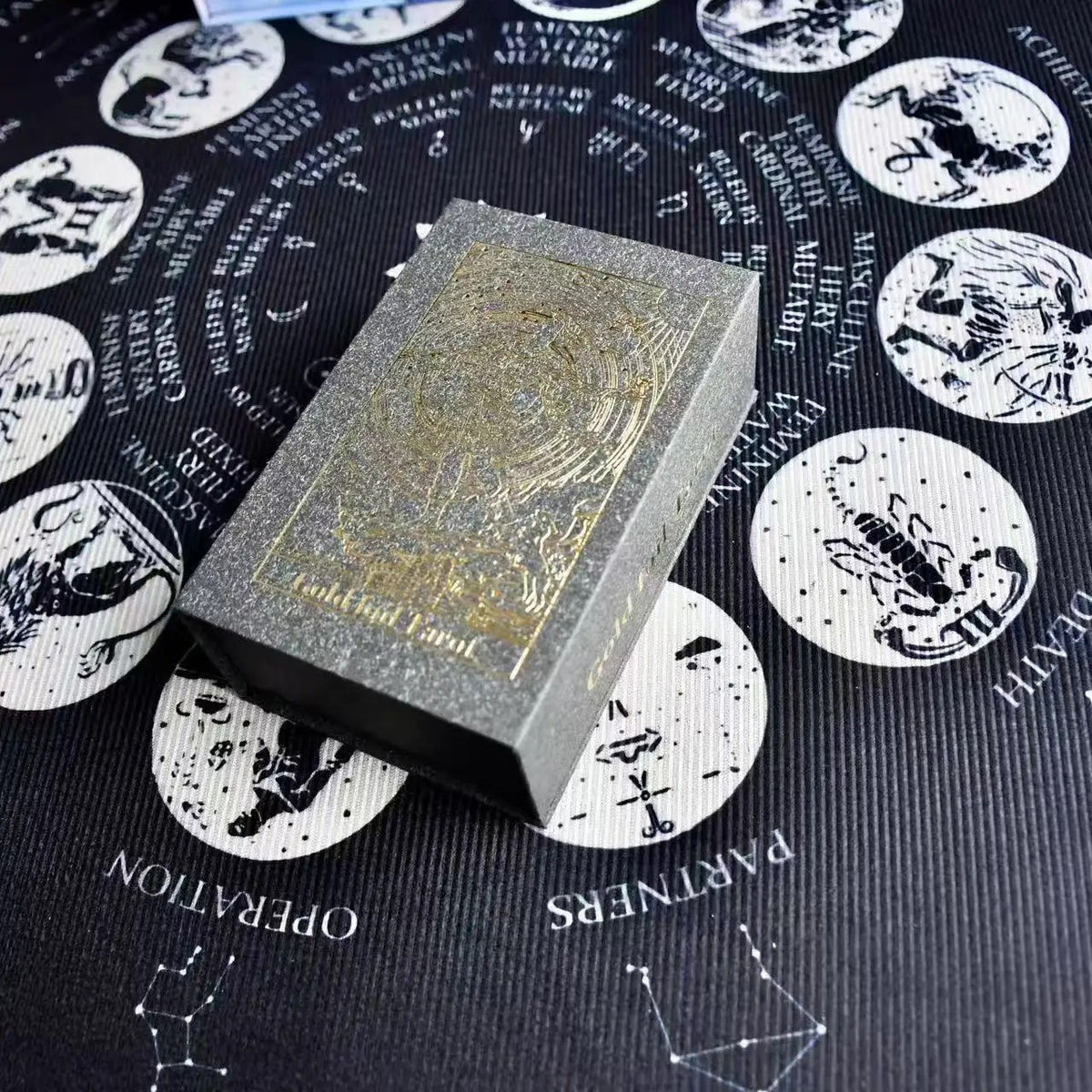 Black presentation box for gold foil tarot deck