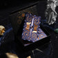 Blue and gold foil tarot deck displayed in an open celestial gift box