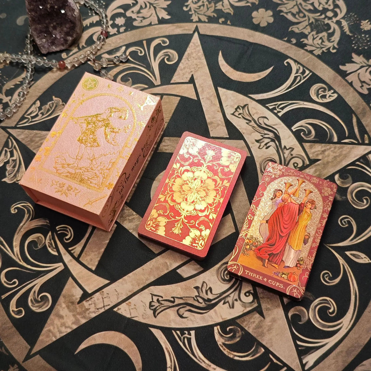 Crimson floral gold foil tarot deck with pink Fool presentation box