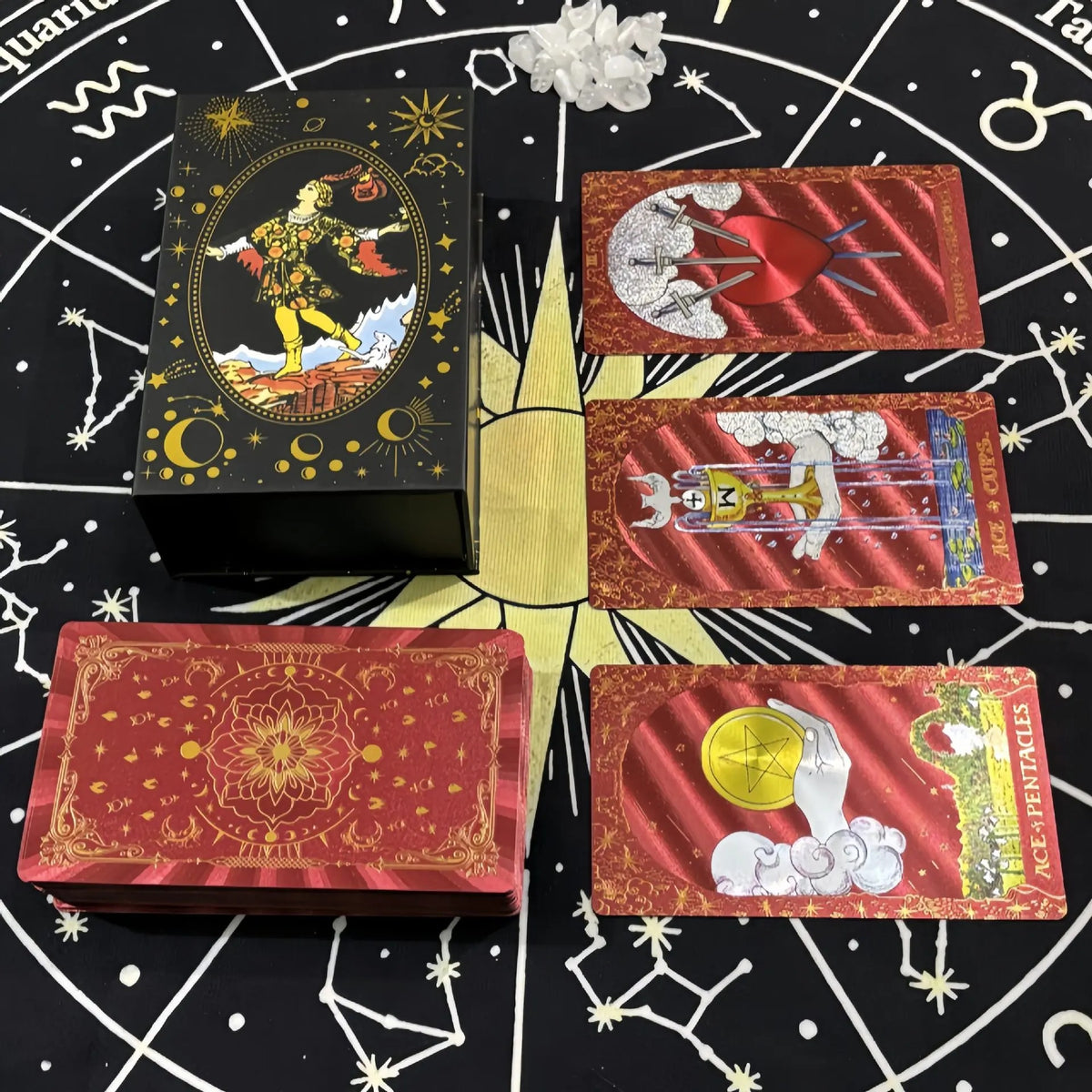 Red gold foil tarot deck with presentation box and card spread